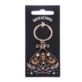 Moth keychain on a black card with 'Moth Keyring' text