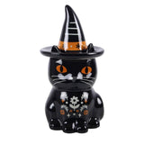 Black cat figurine with a witch hat on a white background