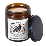 Toasted pumpkin scented candle in a brown jar with a decorative label on a white background