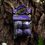Packaged product labeled 'Ritual' against a tree bark background