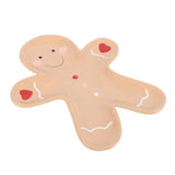 Gingerbread man-shaped cookie on a white background