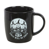 Black mug with a graphic of three women in witch hats and the text 'Girls Will Be Girls' on a white background.