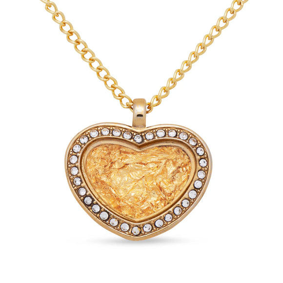 Gold heart-shaped pendant necklace with embedded stones on a white background