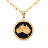 Gold necklace with a pendant shaped like Australia on a white background