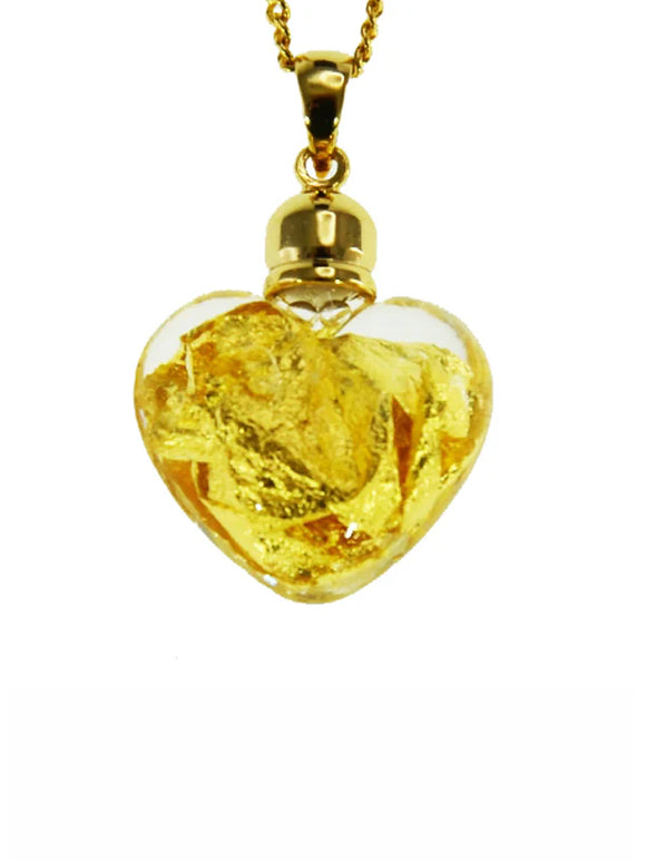 Gold heart-shaped pendant necklace on a white background