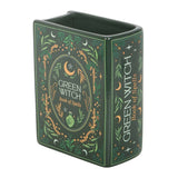 Green Witch Book of Spells with decorative design on a white background