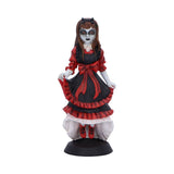Statue of a character in a red and black dress with white accents on a white background