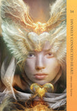 A square book or card cover featuring a close-up portrait of a woman with glowing golden feathers and heart-like light effects. A vertical orange band on the right side reads 'DIVINELY CONNECTED HEART: meet your karma' with the number 34 at the top.