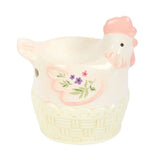 Ceramic chicken-shaped container with floral design on a white background