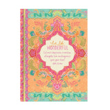 Colorful notebook with floral design and text on a white background