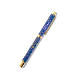 Pen with starry night design and 'destiny' text on a white background