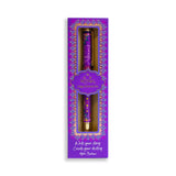 Purple pen with decorative packaging on a white background