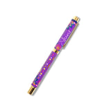 Colorful pen with floral design and 'Shine' text on a white background
