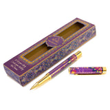 Purple and gold pen set with decorative packaging on a white background