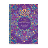Decorative notebook with colorful design and text on a white background