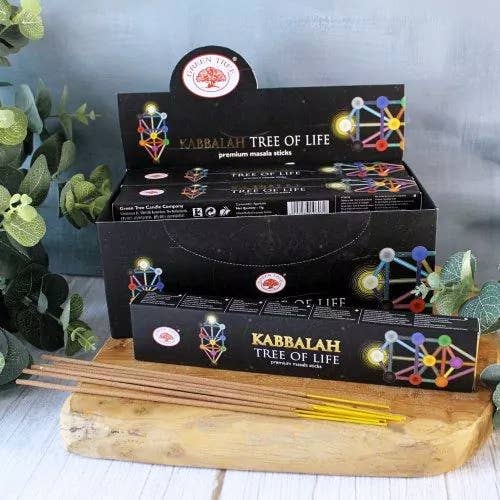 Kabbalah Tree of Life incense sticks packaging with incense sticks on a wooden block.