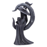 Decorative statue of a figure with outstretched arms and a hat on a white background
