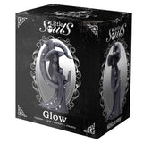 Box of 'Little Souls' figurine with 'Glow' text on a black background