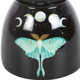 Black ceramic oil burner with a green butterfly design and moon phases on a white background