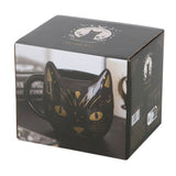 Black cat-shaped mug in a decorative box with moon and star design.