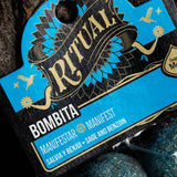 Close-up of a 'Ritual Bombita' product packaging with blue and black design.