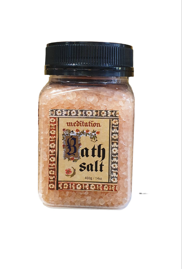Bath salt packaging with decorative labels on a neutral background