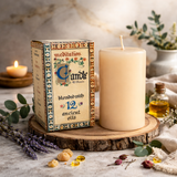 Meditation candle with packaging on a wooden surface, surrounded by decorative elements.