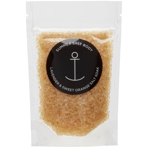 Packaged salt scrub with 'Summer Salt Body' label on a white background