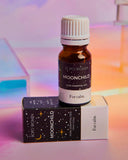 Bottle and packaging of Bopo Women Moonchild essential oil on a colorful background
