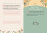 Open book with two pages showing text and decorative elements on a floral background
