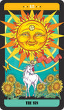 Tarot card featuring a sun with a face, a unicorn, and flowers on a blue background.