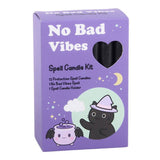 Purple packaging of 'No Bad Vibes' spell candle kit with a cat and potion illustration.