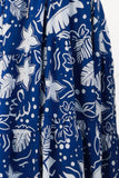 Blue fabric with white floral and leaf pattern