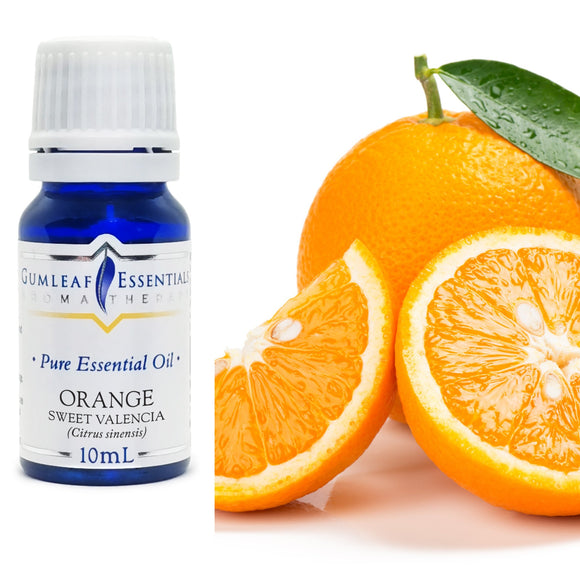 Gumleaf Essentials Orange essential oil bottle with sliced oranges on a white background