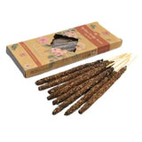 Incense sticks with a decorative box on a white background