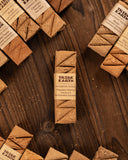 Tribe Earth incense sticks on a wooden surface