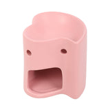 Pink shark-shaped object on a white background