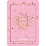 A pink tarot card with gold foil-style line art featuring a sun face and the word 'KNOWING' at the bottom, shown centered on a white background.