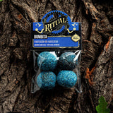 Packaged blue items with 'Ritual' label on a tree bark background