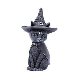 Cat figurine wearing a witch hat with decorative elements on a white background