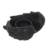 Black dragon egg-shaped container on a white background