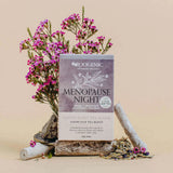Menopause Night tea package with flowers and herbs on a beige background
