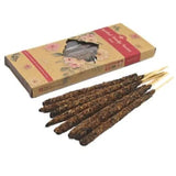 Incense sticks with a decorative box on a white background