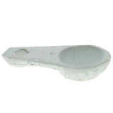 Concrete sink with a unique design on a white background