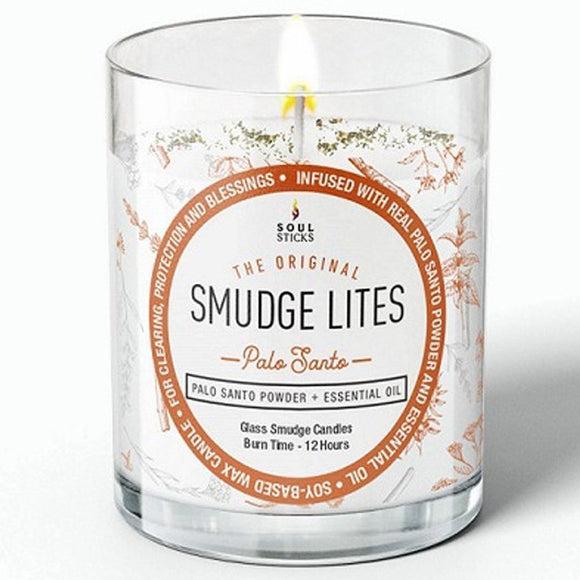 Glass candle with a label on a white background