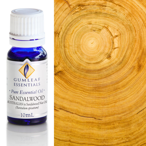 Bottle of Gumleaf Essentials Sandalwood essential oil next to a close-up of sandalwood wood.