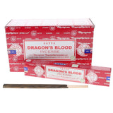 Satya Dragon's Blood incense packaging with incense sticks on a white background