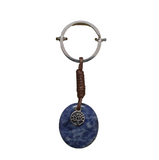 Keychain with blue stone and tree of life pendant on a white background