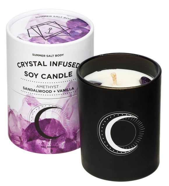 Crystal infused soy candle with packaging on a white background