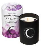 Crystal infused soy candle with packaging on a white background